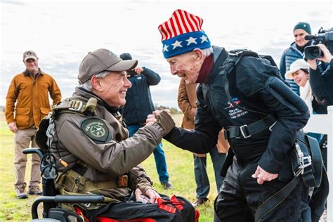 Texas governor skydives for first time alongside 106-year-old World War II veteran